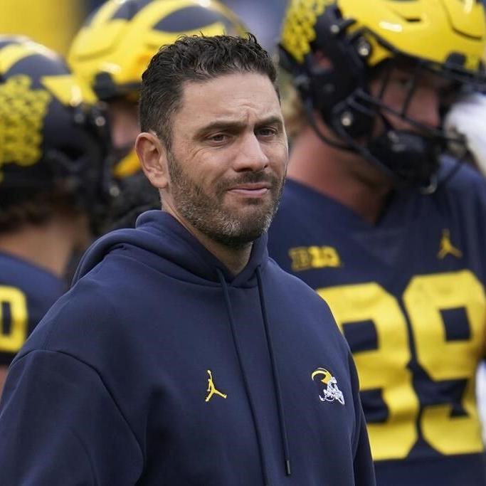 Michigan says it had proof against fired football assistant